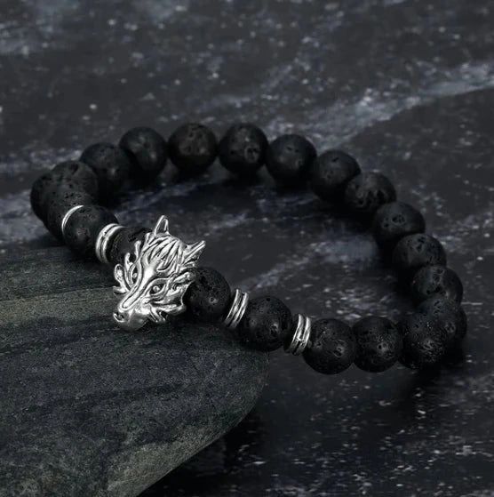 Black lava stone beads with wolf head charm bracelet